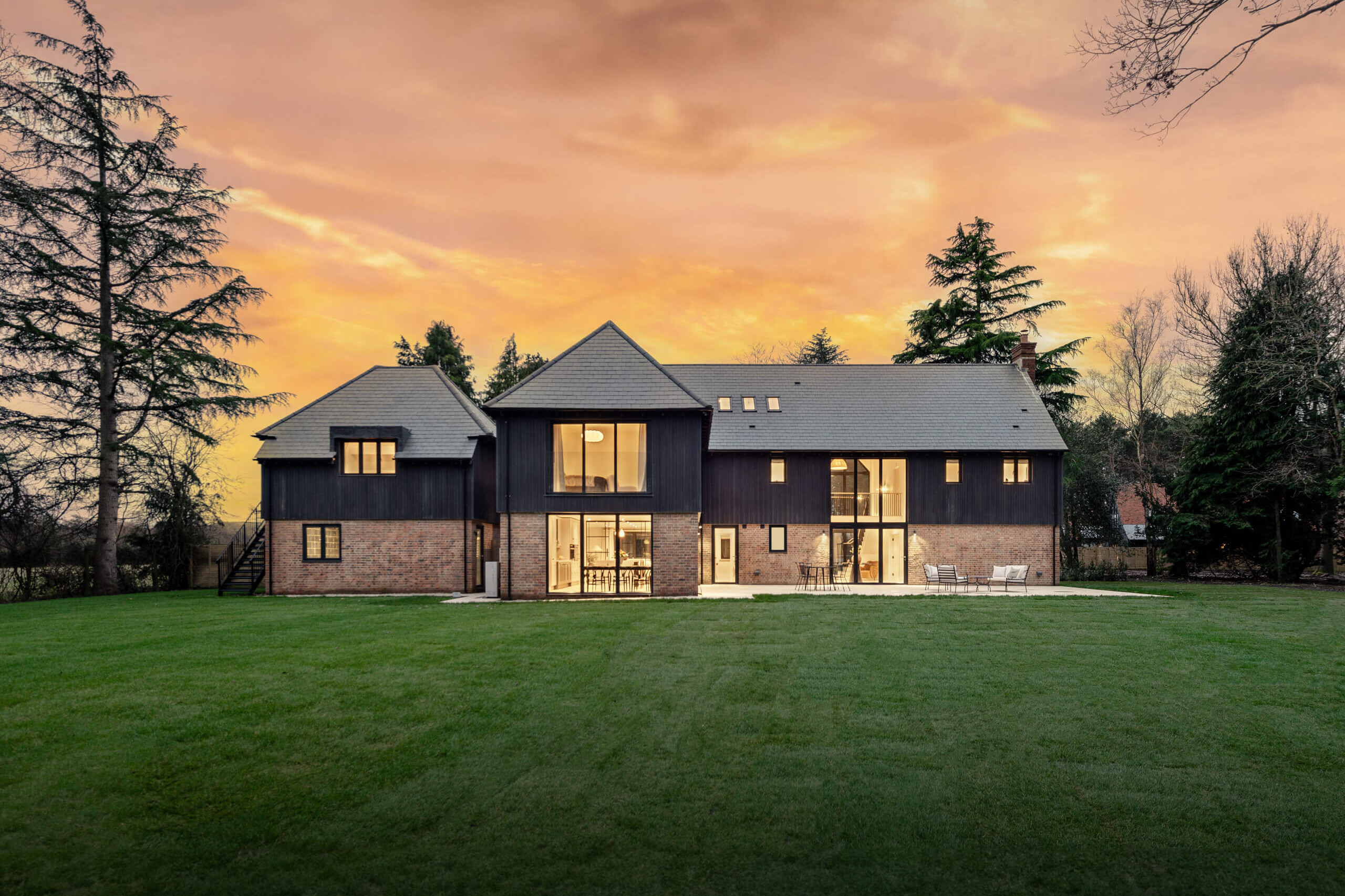 remmus designer homes hammonds mill place brook house external evening photo